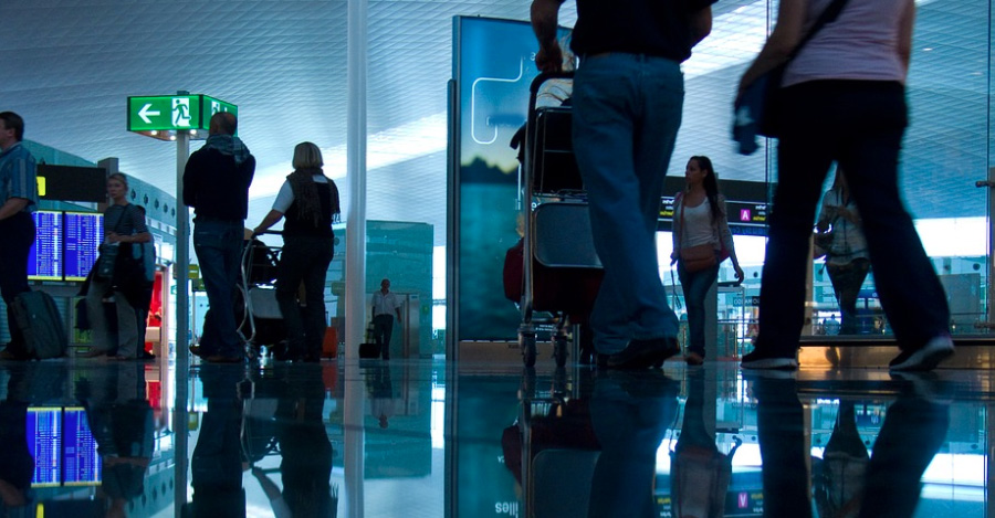 people walking through moscow airport